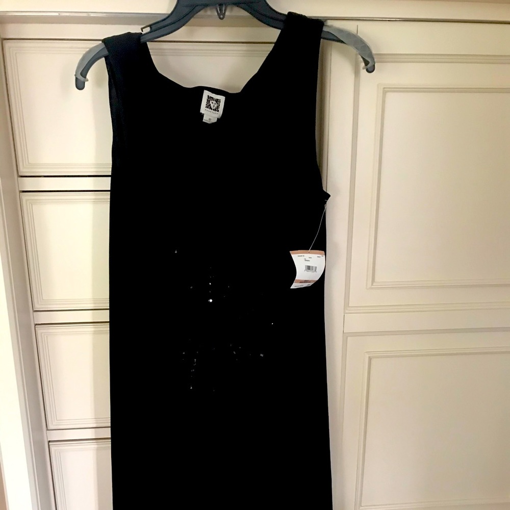 Black jersey dress with jeweled middle